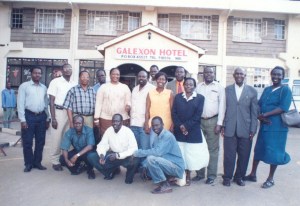 South Sudanese Curriculum Developers took group photo in front of a Hotel in Nairobi after work in 2003